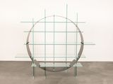 an image of a glass shelf with a circular design on top of it