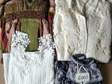 four different types of clothing laid out on the floor
