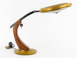 an image of a desk lamp with a wooden base and a white background