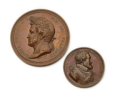 deux pièces de bronze portant le portrait d'un homme et d'une femme