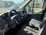 a view of the inside of a van from the driver ' s seat