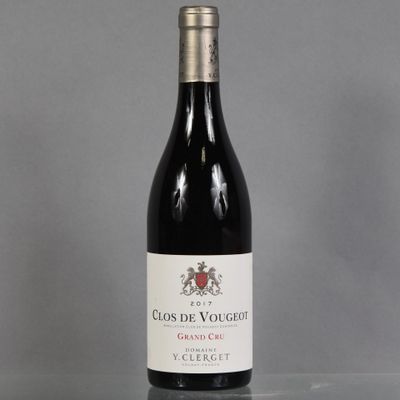 a bottle of wine that is sitting on a table