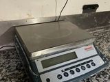 an image of a digital scale on a kitchen counter