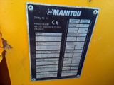 a picture of a sign on the side of a yellow machine