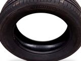 a close up of a tire on a white background