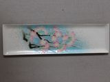 a picture of a plate with a bird and flowers on it