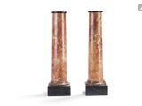 pair of marble pedestals on marble bases