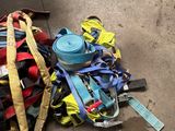 a pile of luggage on the ground next to a bag