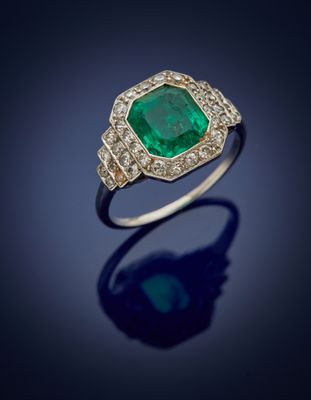 an emerald and diamond ring