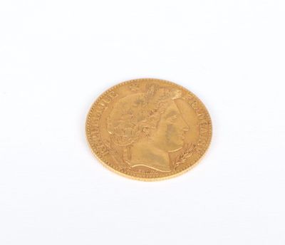 an image of a gold coin on a white surface