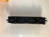 a black train car that is sitting on a table