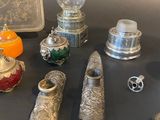 a table with a lot of silver objects on it