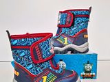 the children ' s boots are blue and red with thomas the train on them