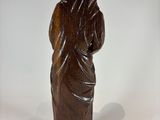 statue of a woman holding a baby in her arms