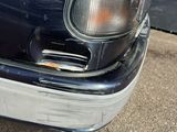 a picture of a car that is parked on the side of the road