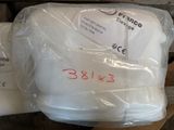 three rolls of toilet paper wrapped in plastic on top of each other