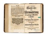 an old book is open on a white surface