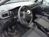 a picture of a car with a steering wheel and dashboard