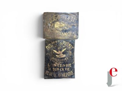 an old metal box with a label on it