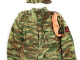 an image of a child ' s camouflage jacket and hat