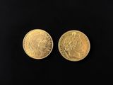 two gold sovereigns, one of which is a sovereign and the other of which is a sovereign