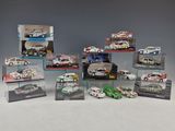 a group of die - cast cars are displayed in a display case