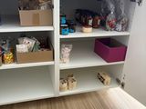 a pantry with a lot of food on the shelves