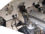 a close up of a car ' s engine with the hood open