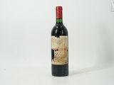 a bottle of wine that is sitting on a table