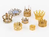six pairs of gold and diamond crown rings