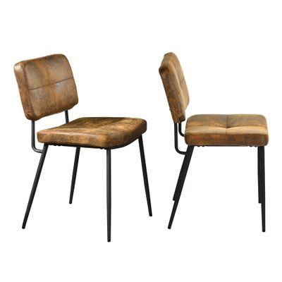 pair of leather chairs with metal legs and backrests on a white background