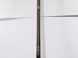 an image of a baseball bat leaning against a wall