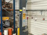 a machine that is sitting inside of a warehouse