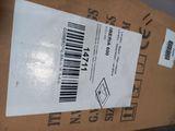 a box with a barcode on it sitting on top of a table