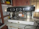 a coffee machine sitting on top of a kitchen counter