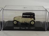 a small model of a car in a display case