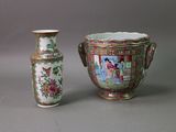 two vases sitting next to each other on a table