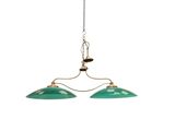 two green glass lamps hanging from a chain