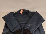 the jacket is blue and has a black collar and cuffs