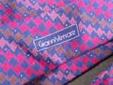 a close up of a tie with a label on it