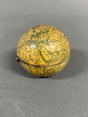 yellow and green globe shaped box with a map on it
