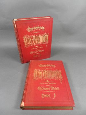 deux livres rouges posés sur une table l'un à côté de l'autre