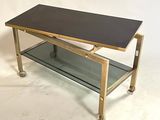 a coffee table with a glass shelf underneath it