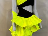 yellow and black dress on mannequin mannequin mannequin mannequin mannequin mannequin mannequin mannequin mannequin