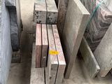 many different types of granite blocks in a warehouse