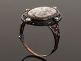 an image of a ring with a stone in the center