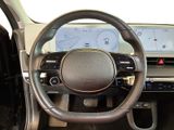 a steering wheel and dashboard of a car with a touch screen