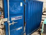 a blue container sitting inside of a building
