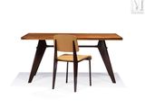 an image of a wooden table with a chair on it