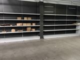 empty shelves in a warehouse with boxes and boxes on them